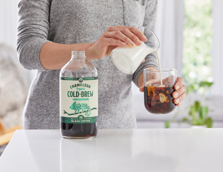 Woman pouring ccb into bottle.